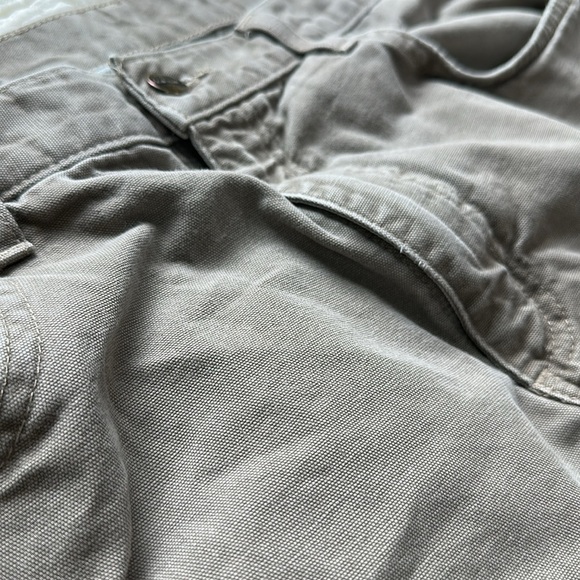 Carhartt distressed carpenter pants with some stains and holes. #10015 - Picture 5 of 11